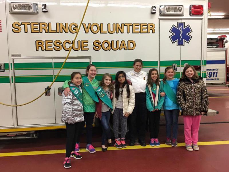Girl Scouts infront of apparatus